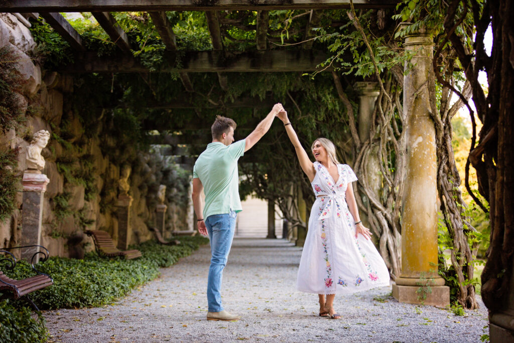 Couple dancing during their engagement photos, best surprise proposal