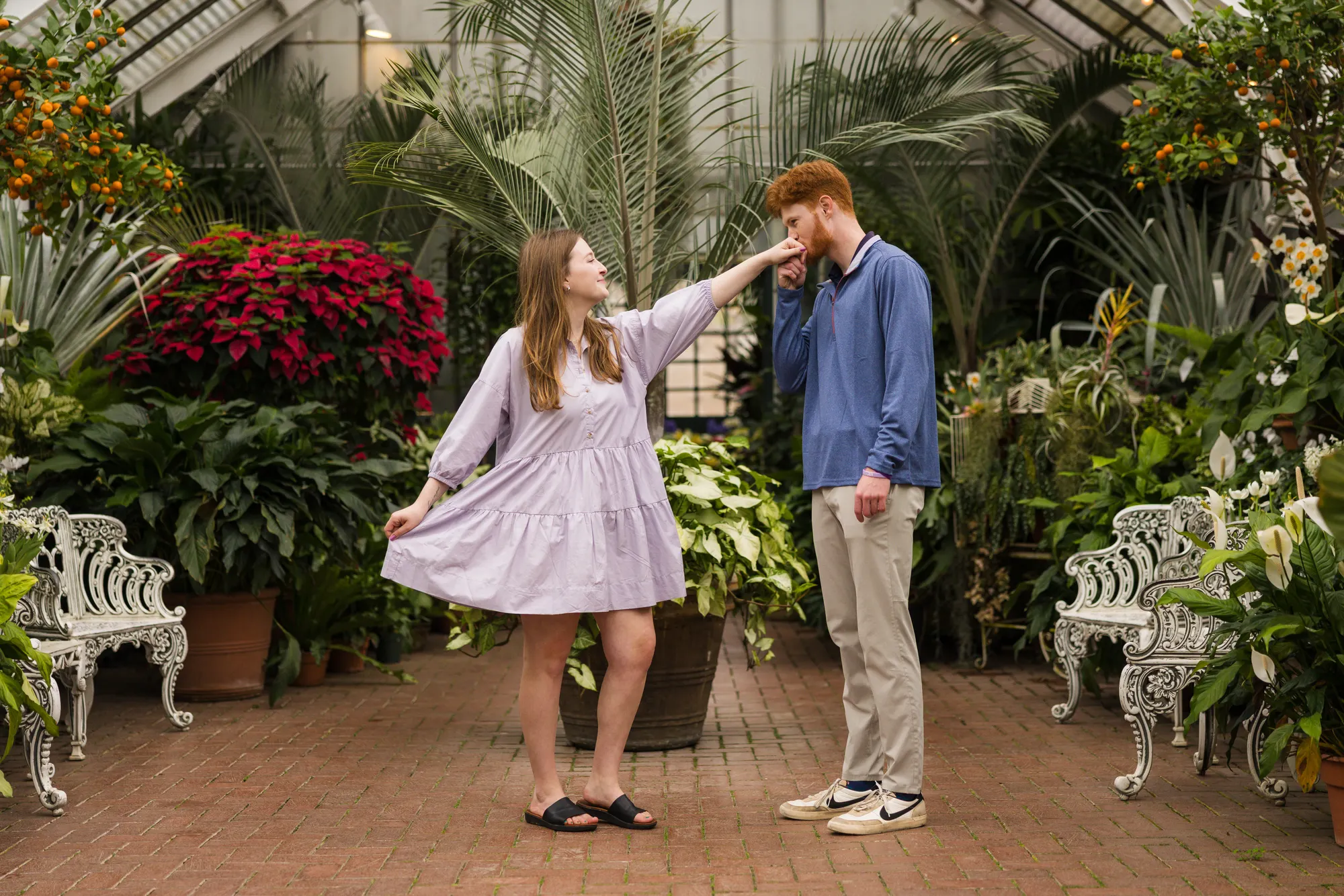 Couple in a sitting room of the Biltmore Conservatory, a covered rain backup location for proposals