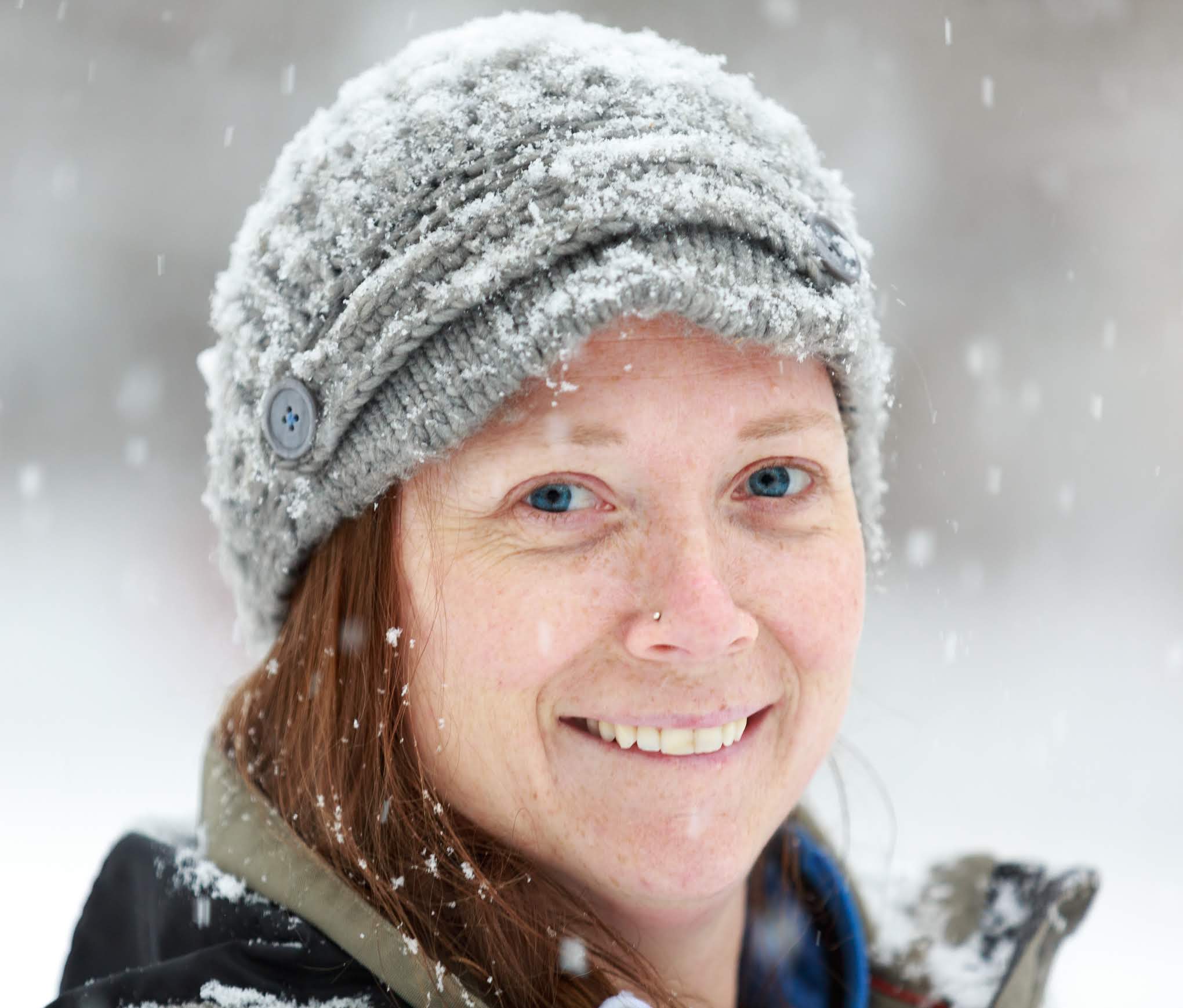 Portrait of Julie Thomas, photographer and client experience lead at Forge Mountain Photography in Mills River, North Carolina