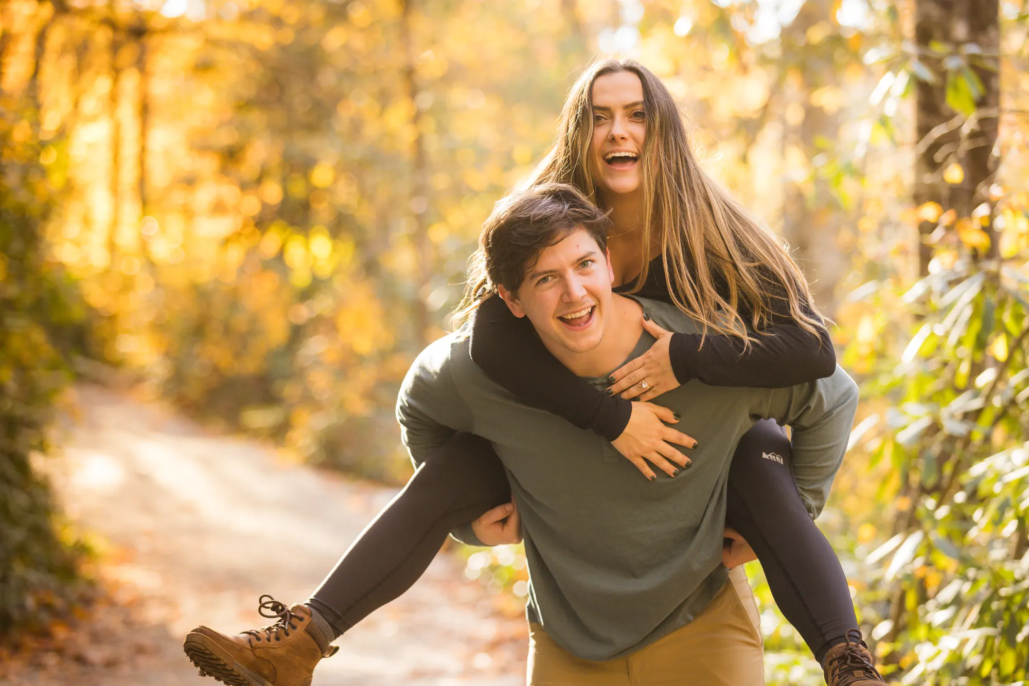 Piggyback ride on a golden fall trail, DuPont State Forest engagement