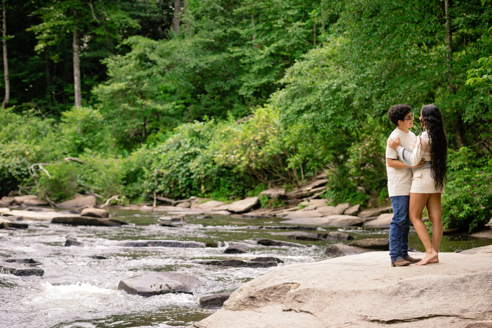 Summer engagement photos on Little River rocks, DuPont NC