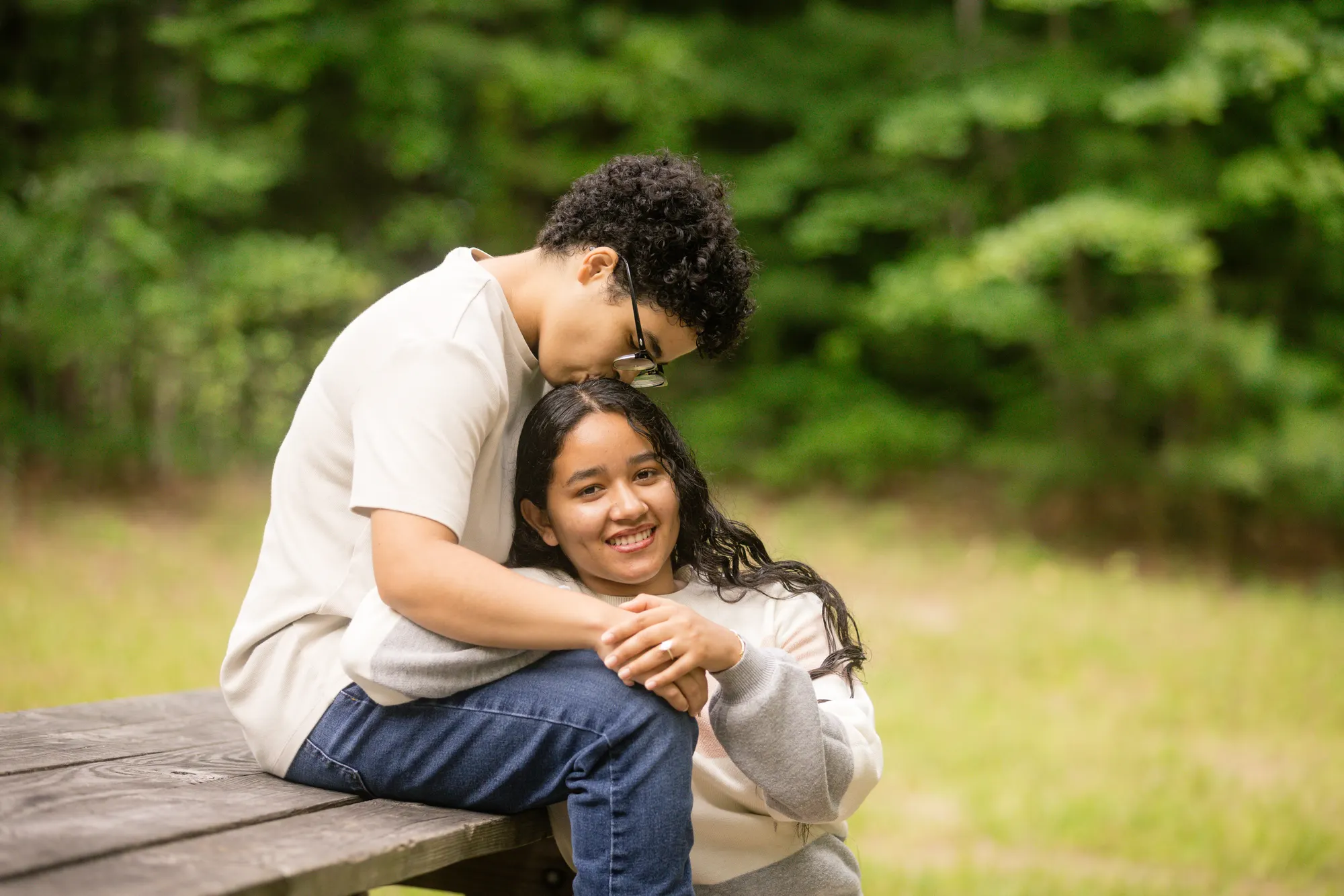 Couple in a green meadow, DuPont State Forest engagement session